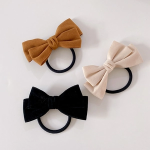 Three-piece set of cute bow phone wire hair ties in brown, beige, and black fabric