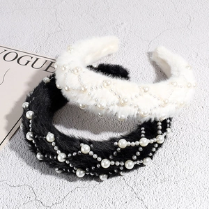 Plush faux fur headband with pearl mesh decor in black and white colors