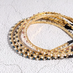 Elegante gouden metalen haarbanden met handgemaakte kristallen kralen en witte parels