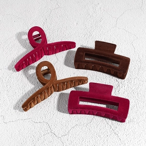 Set of four flocking shark hair clips in rose pink and brown for elegant hairstyles