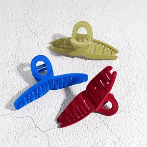 Large flocked square shark hair clips in green, blue, and red for thick hair styling