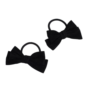 Pair of black velvet bow hair ties with elastic spiral bands on a white background