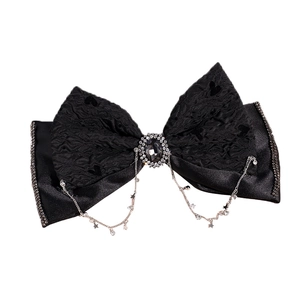 Elegant black double-layer bow hair clip with rhinestone tassels and grey gemstone center