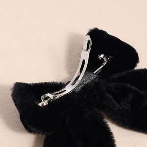 Elegant black plush bow hair clip with silver metal spring barrette for women