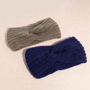 Winter knitted elastic wide headband in khaki and navy blue with a stylish cross knot