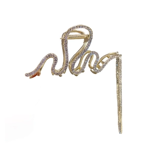 Pinza per capelli a onde dorate in metallo con strass brillanti e lunghe nappe eleganti