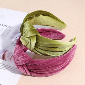 Retro knotted velvet headband in olive green and dusty pink colors for women