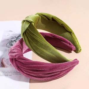 Retro velvet knot headband set in green and berry red with a soft glossy texture