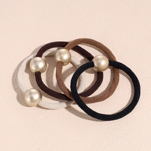 Set of four minimalist high-elastic hair ties with matte gold beads in neutral colors