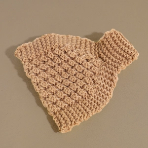 Detailed close-up of camel knit headband featuring thick chunky weave and diamond texture
