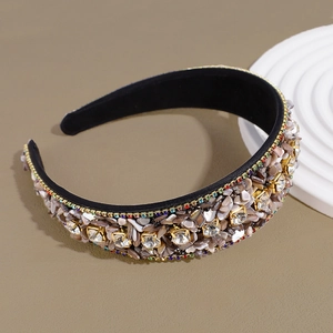 Detailed macro view of baroque headband with turquoise stone and rhinestone inlay