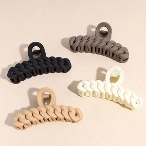 Matte chain link hair claw clips in black, coffee, cream, and khaki colors
