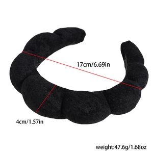 Detailed view of black padded sponge headband with 17cm width and 4cm thickness dimensions