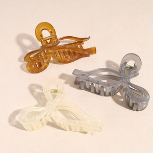 Lot de 3 pinces à cheveux élégantes en forme de nœud, tons ambre, gris et blanc crème
