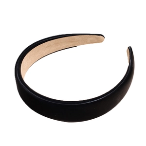 Minimalist matte black PU leather headband with non-slip camel velvet lining for women