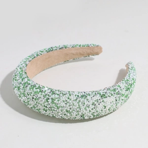 Baroque style wide sponge headband with green and white beadwork and plush lining