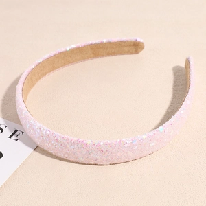 Detailed view of pink sequin headband with soft non-slip suede lining for women