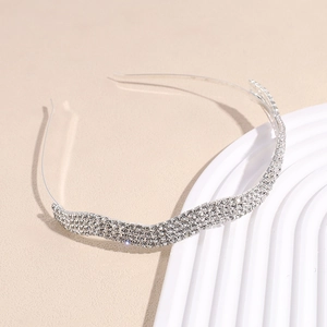 Silver hairband with four rows of sparkling crystals for weddings and elegant parties