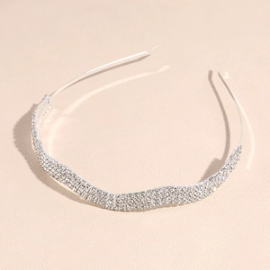 Elegant silver hairband with triple row sparkling crystal waves for wedding bridal hair styling