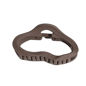 Minimalist matte brown wavy hair claw clip for thick hair shown on white background