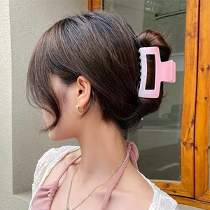 Pink gradient square hollow hair claw clip shown on model for elegant daily hairstyling