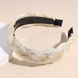 Detail of champagne braided headband with sparkling sequins and non-slip inner teeth