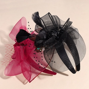 Elegant vintage bridal fascinator headband with feathers, mesh bow, and bead rose flowers
