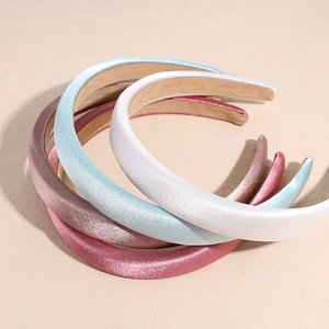 Morandi colored sponge padded headbands in white, blue, and pink silk fabric