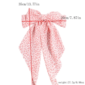 Fiocco per capelli floreale con nappine lunghe e dimensioni di 35cm per 20cm