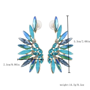 Detail of colorful gemstone wing earrings showing size dimensions and weight info