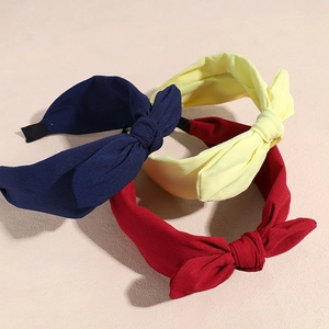 Solid chiffon bow headbands set in navy blue, bright yellow, and deep red for women