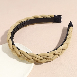 Detail view of khaki braided headband with non-slip inner teeth and comfortable ends