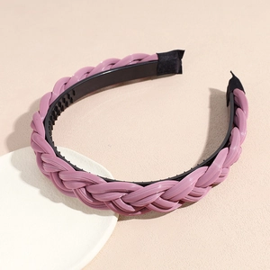 Close-up of purple woven headband featuring anti-slip inner teeth and soft padding
