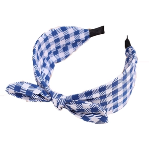 Blue and white plaid fabric headband with cute bunny ears and a bow on white background