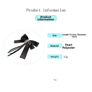 Detailed size specifications of the black satin ribbon bow hair clip with pearl details