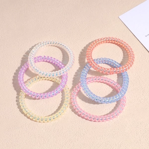 Elastici per capelli a spirale cangianti in 6 colori con finitura metallica arcobaleno