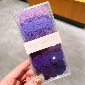 Détail du lot de 6 chouchous dégradés violets avec texture éponge haute élasticité
