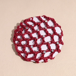 Detailed view of red woven hairnet with sparkling rhinestones for hair buns