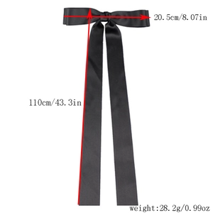 Detail showing dimensions of a 110cm long black silk bow hair clip with ribbons
