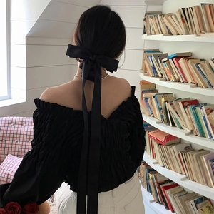 Long black silk ribbon bow hair clip with streamers in balletcore style for women