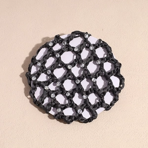Detailed view of black hair net with sparkling rhinestones for ballet or flight attendants