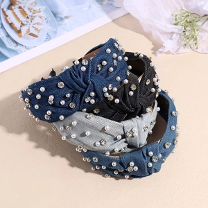 Set of 4 denim knotted headbands with pearls and rhinestones in various blue and grey shades