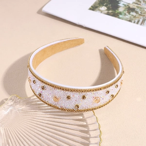 Sparkling wide headband with iridescent sequins and gold rhinestones for elegant hair styling