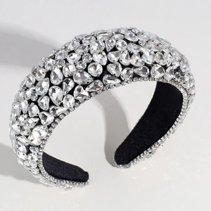Macro detail of the silver luxury headband featuring shimmering crystals and black velvet lining