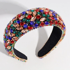 Macro detail of luxury Baroque headband with multicolored rhinestones and padded black lining