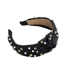 Fashionable black denim wide headband featuring knotted fabric with pearls and rhinestones