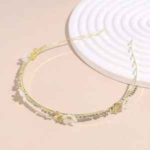 Serre-tête papillon doré élégant avec strass brillants et décoration de fleurs blanches