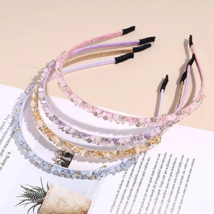 Set of four luxury rhinestone crystal headbands in pink, purple, gold and blue