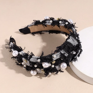 Detail of denim headband with pearls and rhinestones on a vintage plaid fabric base