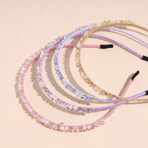 Luxurious rhinestone crystal headbands in pink, blue, purple and gold for elegant women